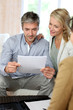 Couple meeting advisor at home