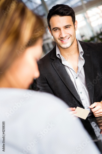 Foto: Man checking in a hotel Man checking in a hotel