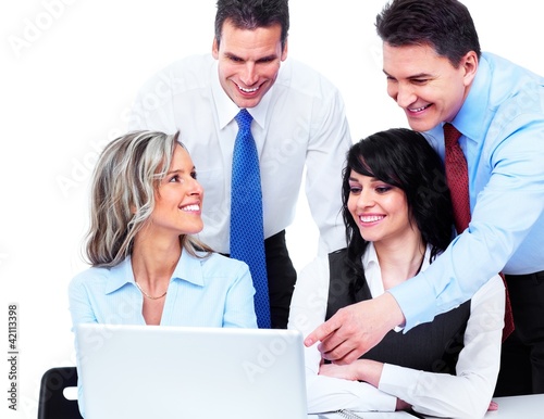 Photo: Group of business people working. Group of business people working.