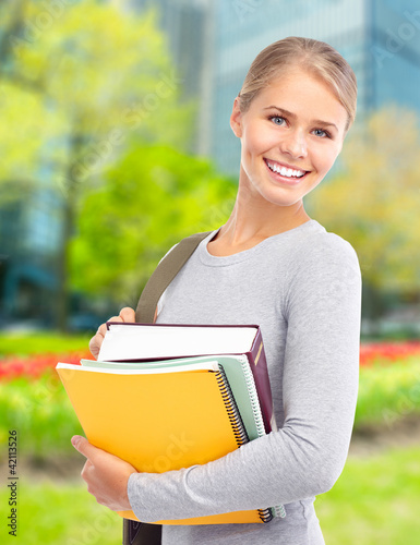Foto: Young student woman. Young student woman.