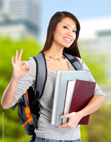 Foto: Young student woman. Young student woman.