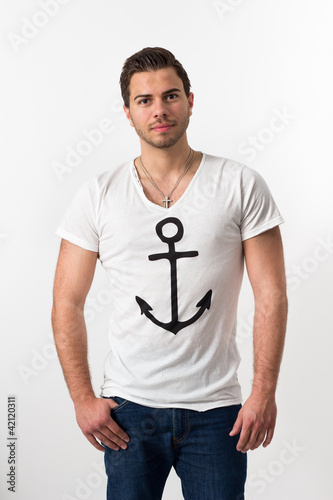 Photo: Young brunette Man with Anchor T-shirt Young brunette Man with Anchor T-shirt