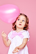 Sweet  girl with pink balloon