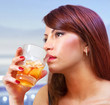 woman with glass of whisky