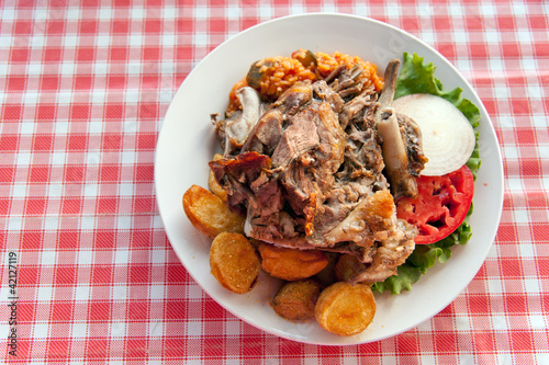 Photo: Traditional roasted pork in Croatian restaurant Traditional roasted pork in Croatian restaurant