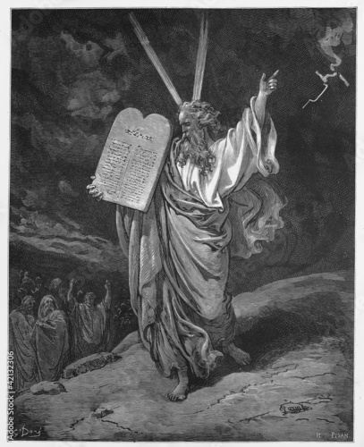 Photo: Moses comes down from the mountain with the tablets of Law Moses comes down from the mountain with the tablets of Law
