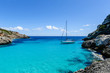 Sailing boat at anchor. Paradise wild bay. Cala Marmolis.