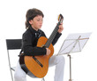 Photo: Little boy musician playing guitar Little boy musician playing guitar