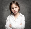 little girl with bored expression