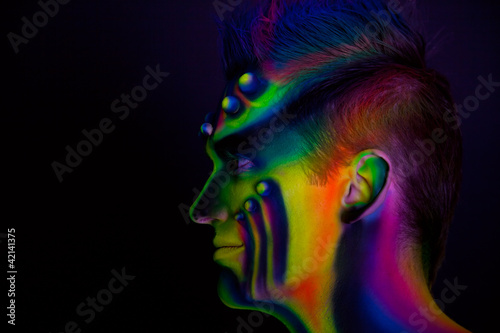 Photo: Man with fluorescent bodyart Man with fluorescent bodyart