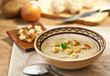 Soup and ingredients on the table, studio shot