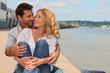 Couple embracing at the pier