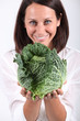 Woman showing cabbage