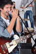 Man singing in a band