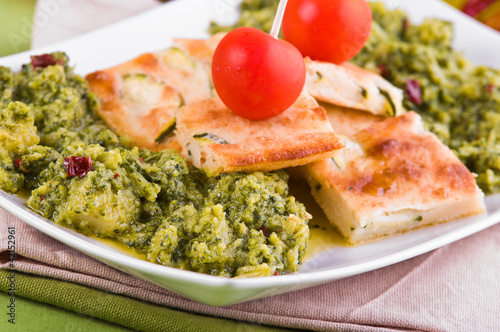 Photo: Zucchini focaccia with broccoli. Zucchini focaccia with broccoli.