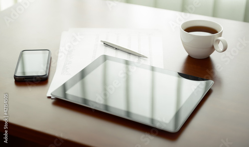 Photo: Modern workplace with digital tablet Modern workplace with digital tablet