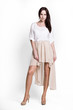Photo: Beautifull woman in beige dress Beautifull woman in beige dress