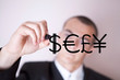 Photo: businessman wtiting currencies sign businessman wtiting currencies sign