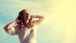 beautiful girl listening to music on headphones