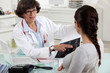 Female doctor with patient