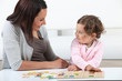 mother playing with her daughter
