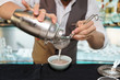 Bartender is making cocktail