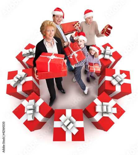 Photo: Family with Christmas gifts Family with Christmas gifts