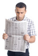 Photo: Young man reading newspaper Young man reading newspaper