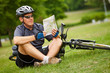 Biker with map