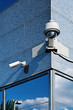 Foto: Security Camera in a Modern Building Security Camera in a Modern Building