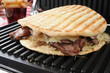 Roast beef sandwich on a panini press