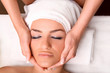 Photo: Closeup of human hands massaging pretty woman's face Closeup of human hands massaging pretty woman's face