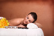 Photo: Portrait of young beautiful woman in spa environment. Portrait of young beautiful woman in spa environment.