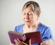 Elderly  woman with book
