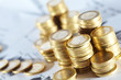 Photo: Business diagram on financial report with coins Business diagram on financial report with coins