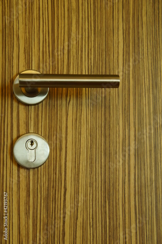 Photo: Wooden Door with Modern Knob Wooden Door with Modern Knob