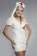 Very sexy woman in kinky nurse outfit