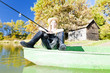 fishing woman sitting on boat