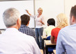Senior tutor teaching class