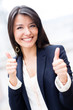 Businesswoman with thumbs up