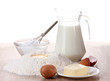 Ingredients for the dough wooden table on white background
