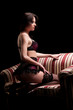 Photo: brunette on the couch brunette on the couch