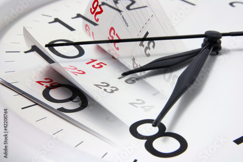 Photo: Calendar Pages and Clock Calendar Pages and Clock