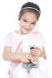 Little girl doctor with teddy bear