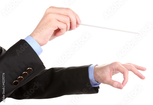 Photo: Music conductor hands with baton isolated on white Music conductor hands with baton isolated on white