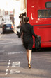 Photo: Businesswoman running for bus Businesswoman running for bus
