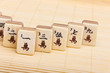 Old chinese game mahjongg on bamboo mat background