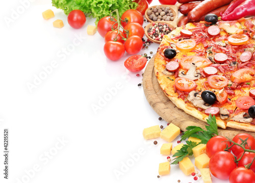 Photo: delicious pizza, vegetables and salami isolated on white. delicious pizza, vegetables and salami isolated on white.