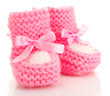 pink baby boots isolated on white