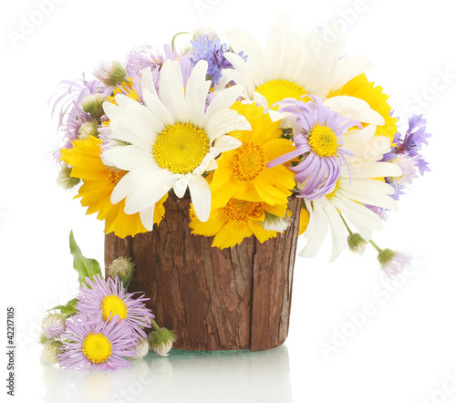 Photo: bouquet of wildflowers in watering can isolated on white bouquet of wildflowers in watering can isolated on white